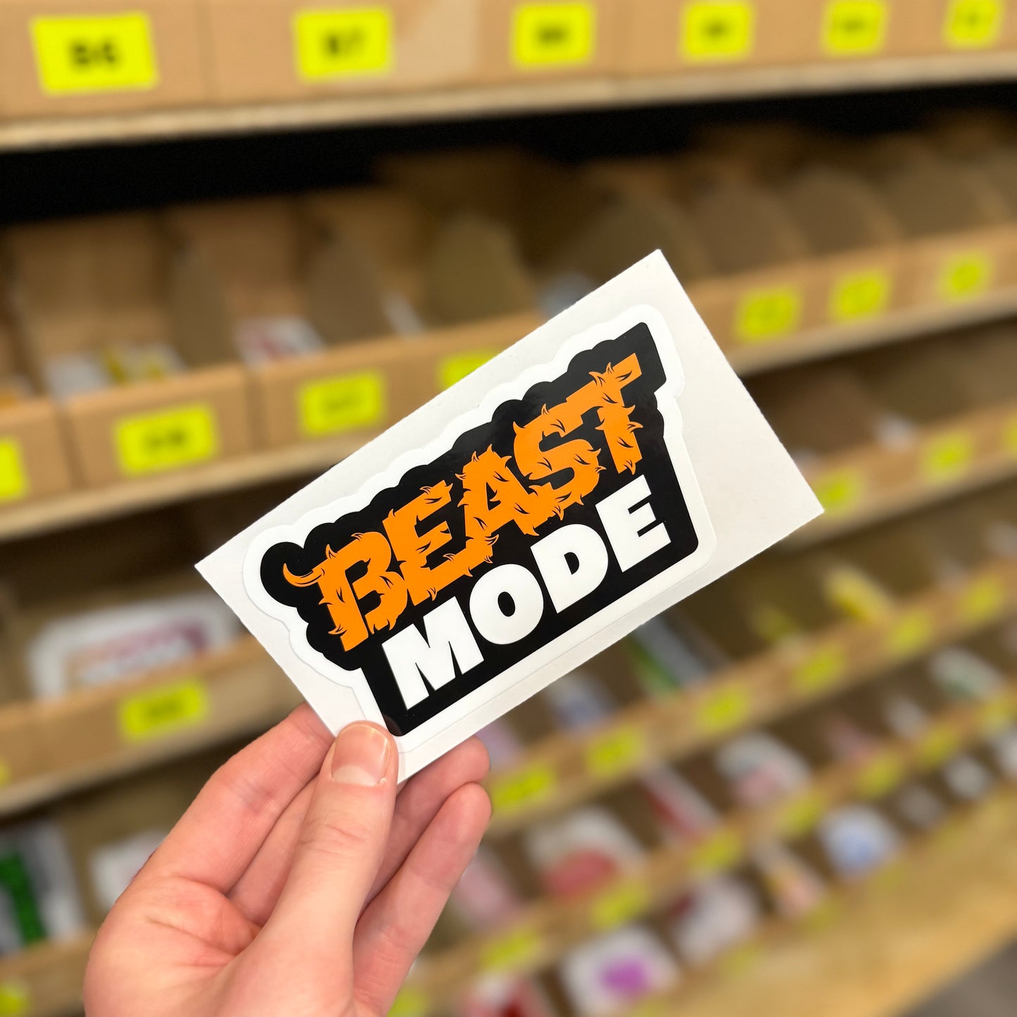 Funny motivational sticker with “Beast mode” text in bold aggressive lettering