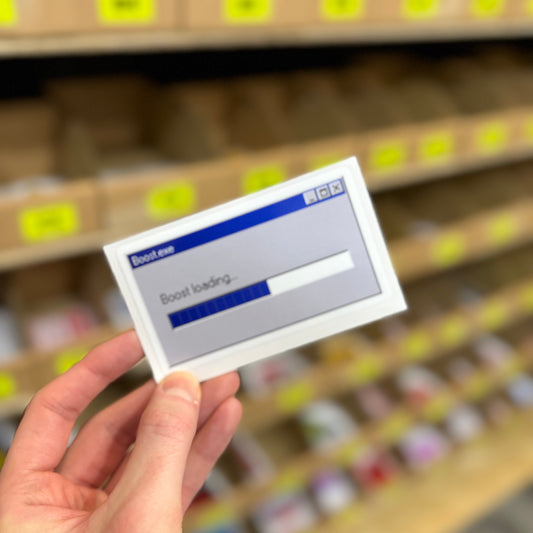 Funny computer loading bar sticker reading “boost loading” retro tech design