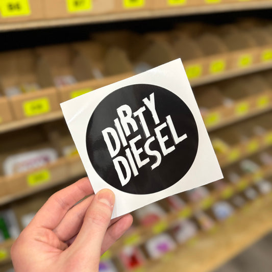 Funny car enthusiast sticker reading “dirty diesel” in bold black and white text