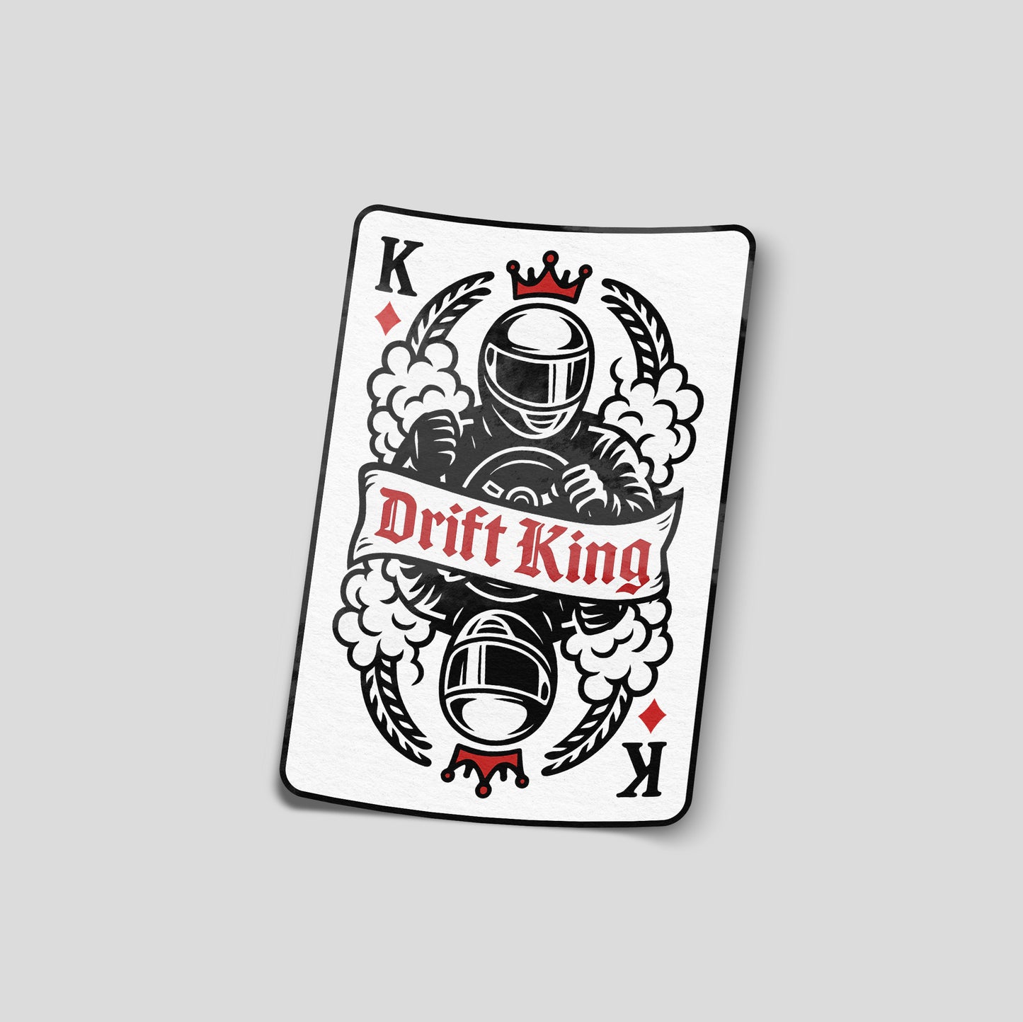 Illustrated Drift King funny car sticker designed like a playing card with a helmeted driver and smoke graphics, UK drifting humour decal.