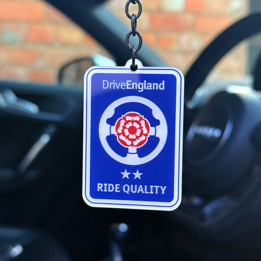Drive England keychain with steering wheel and rose design, UK themed automotive keyring, durable acrylic accessory for car enthusiasts