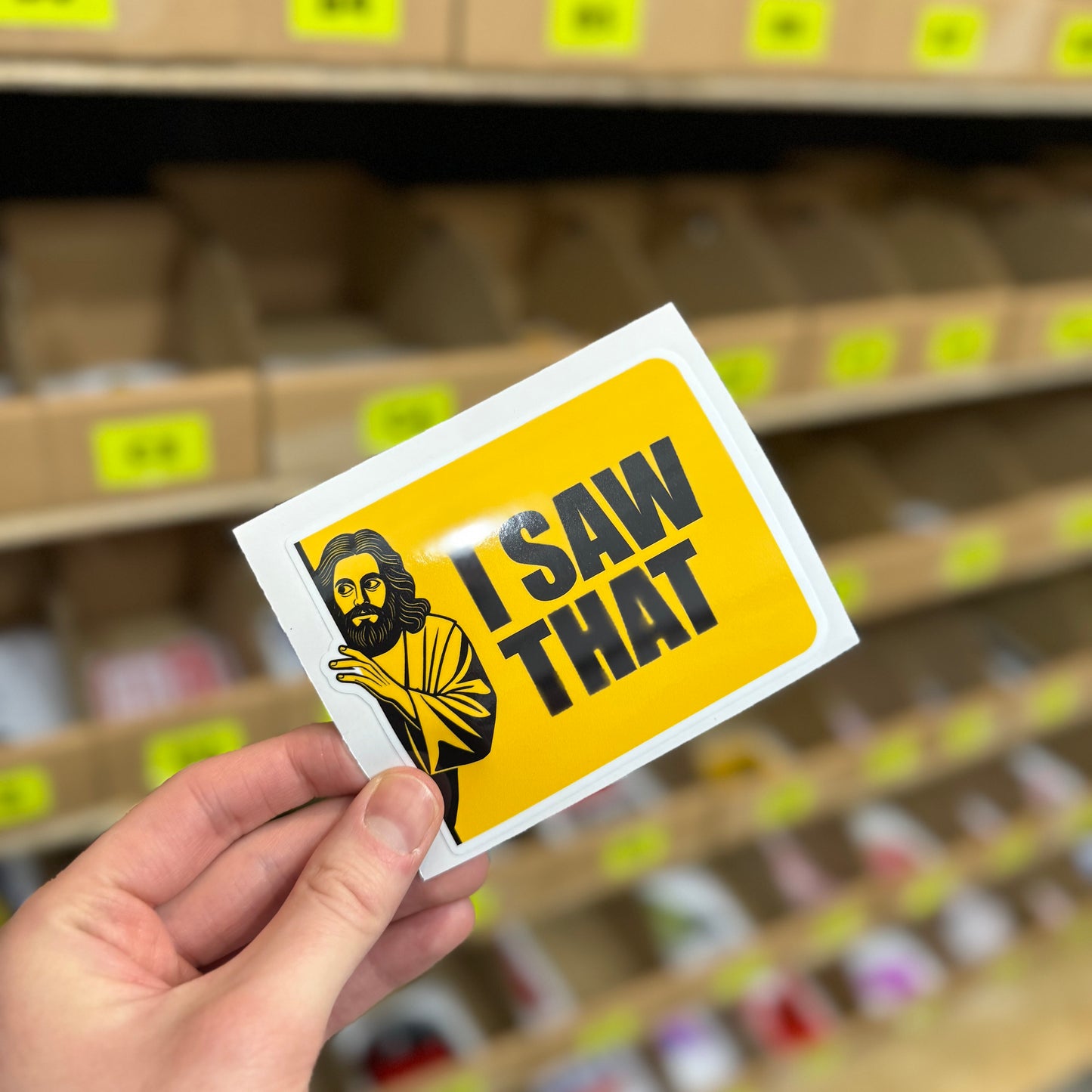 Funny warning sticker featuring illustrated figure with “I saw that” text
