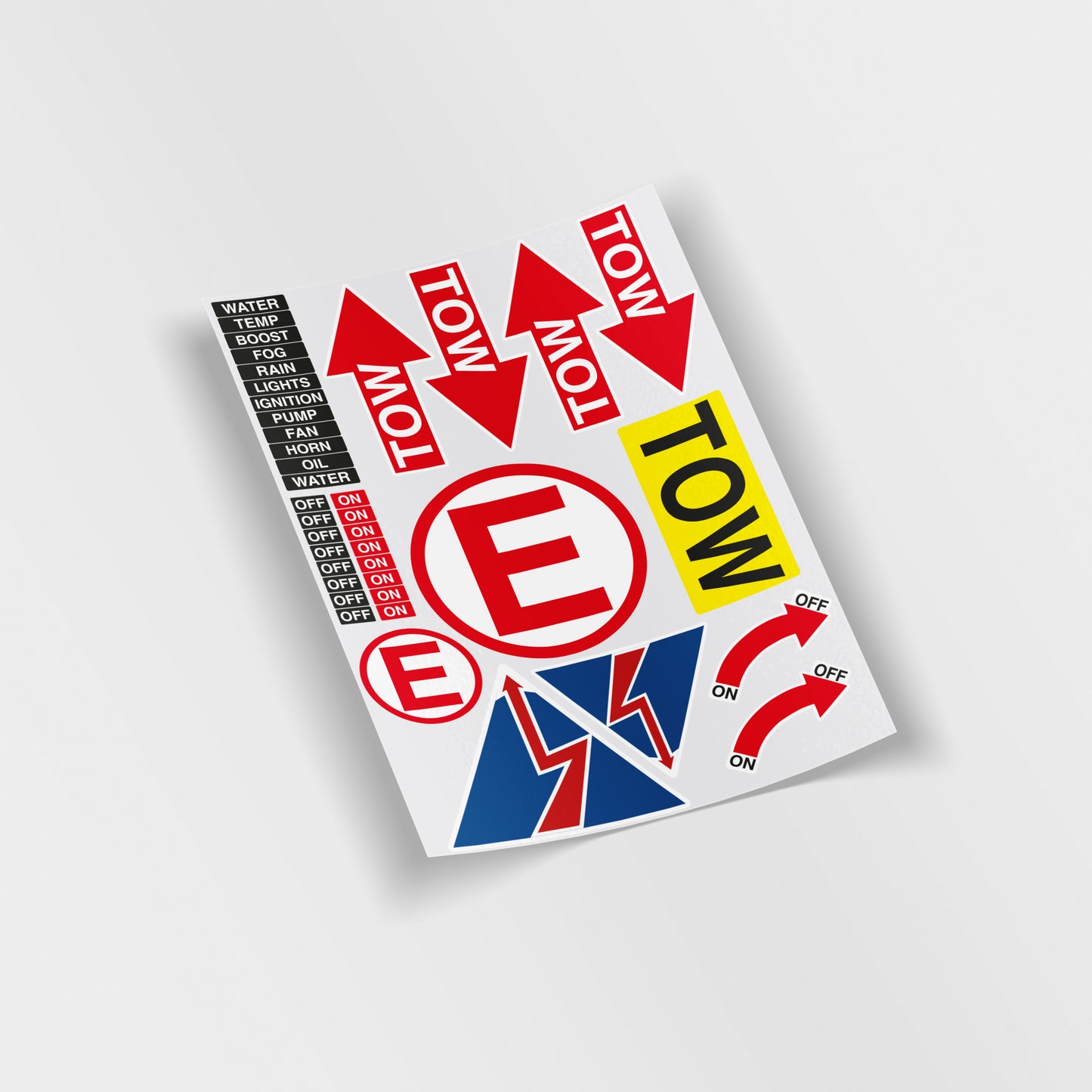 Motorsport scrutineering sticker sheet featuring FIA style safety decals including tow arrows, fire extinguisher E symbol, electrical kill switch triangle and dashboard labels, printed on waterproof vinyl in the UK for race and track cars