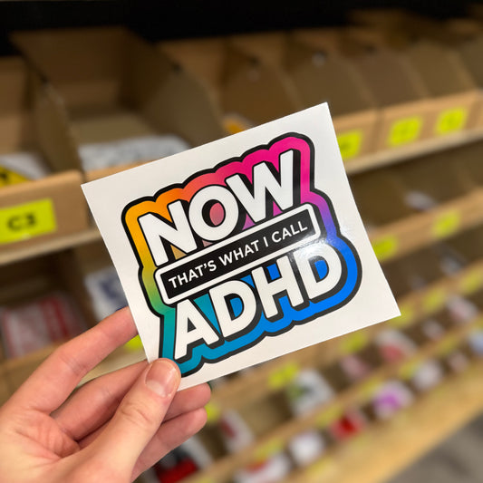 Funny rainbow sticker reading “now that’s what I call ADHD” parody album cover style