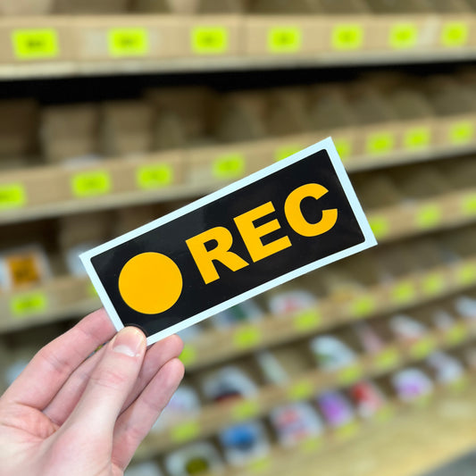 Funny parody sticker styled like recording icon with adult website inspired design