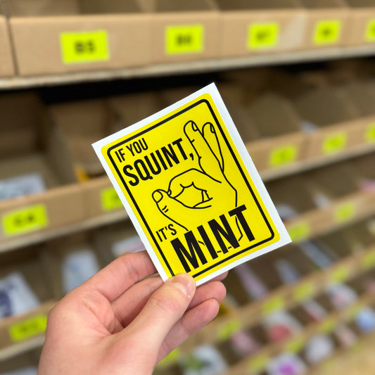 If you squint it’s mint funny vinyl sticker with yellow warning sign style graphic