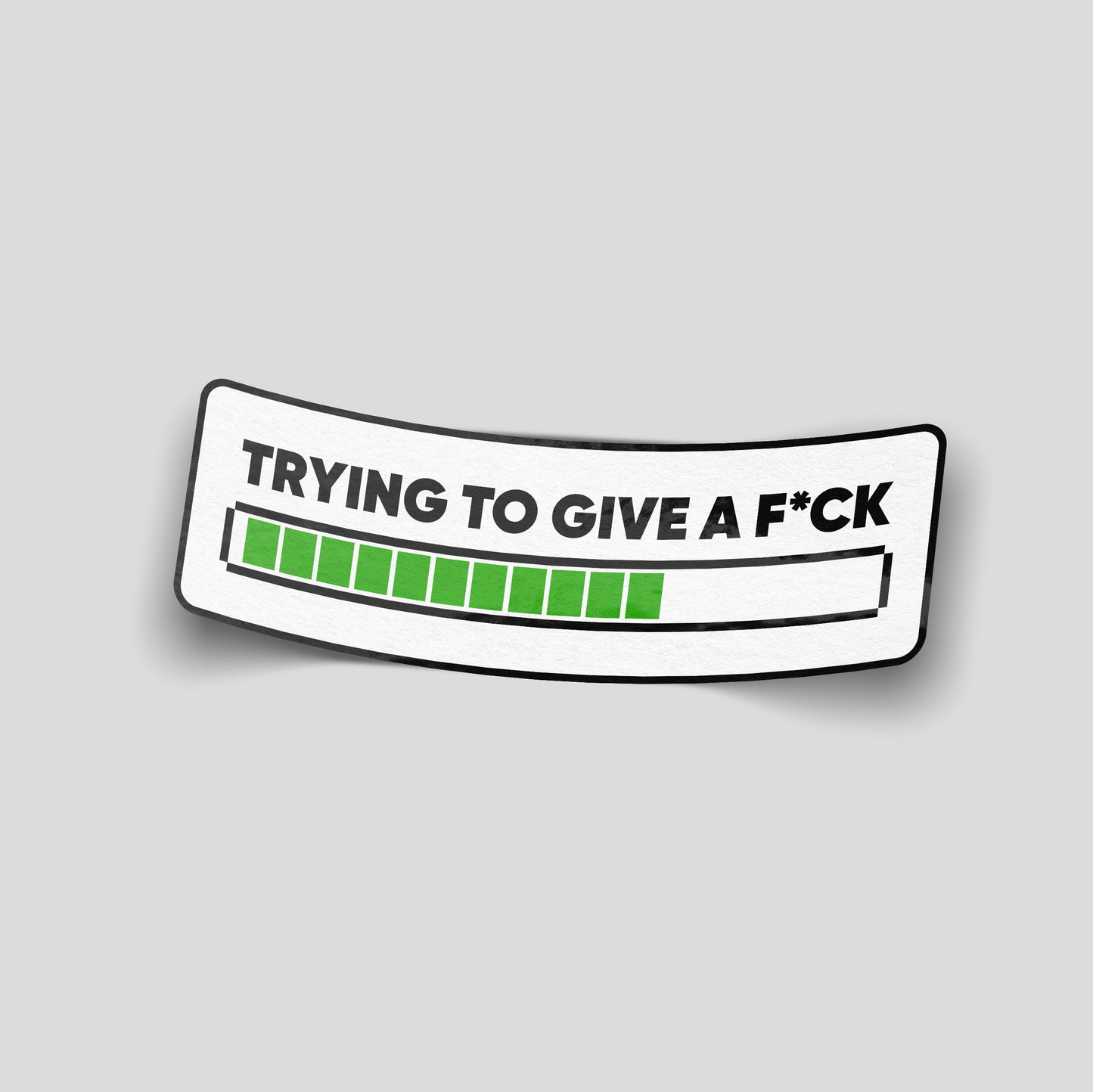 White funny car sticker with black text “Trying to give a f*ck” above a green progress bar graphic, UK novelty decal.