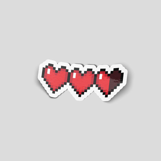 Set of three pixelated red hearts in retro gaming style, novelty funny car sticker for UK gamers.