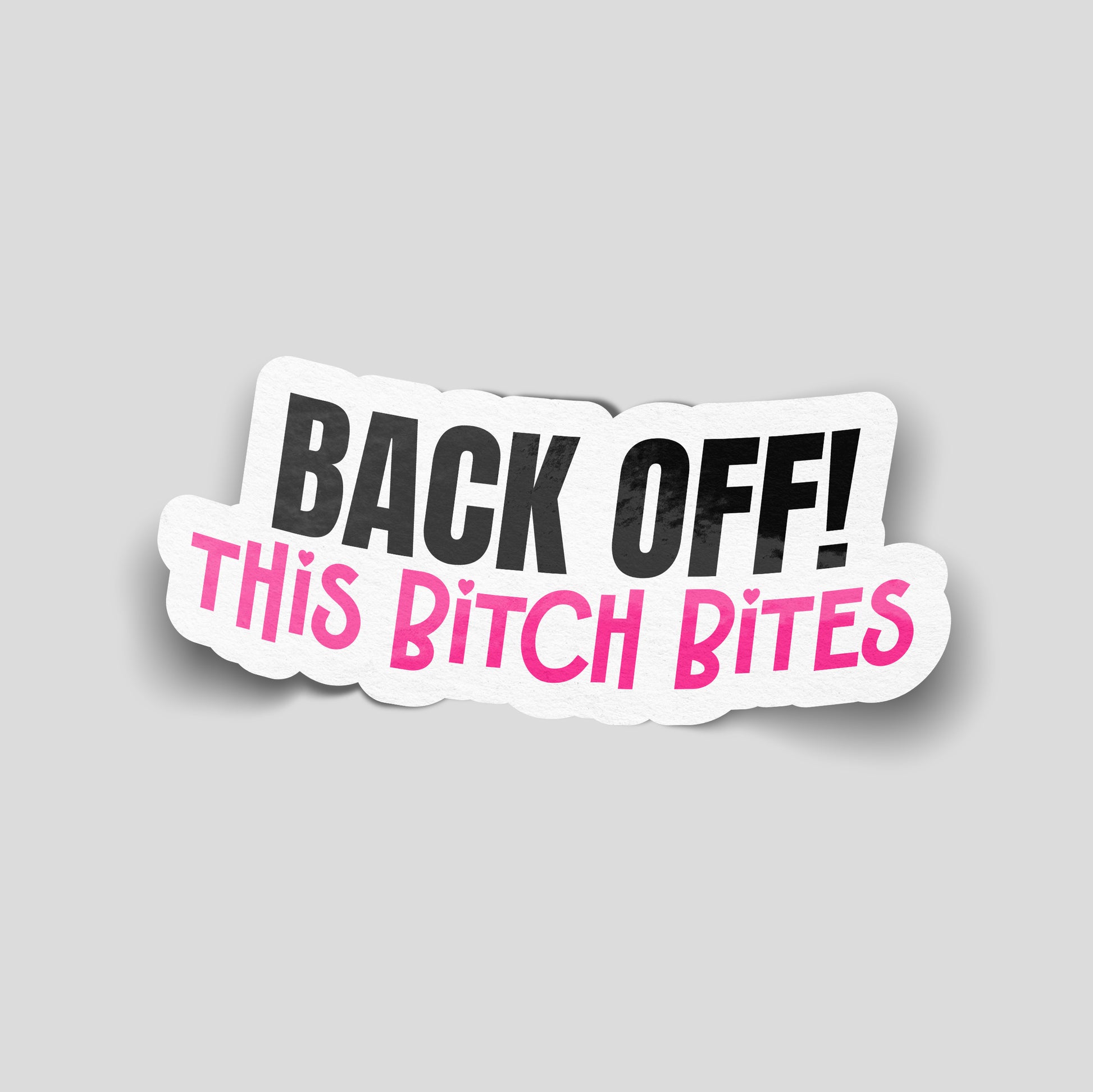 Bold black and pink text reading “Back off! This bitch bites” on a white background, attitude‑style funny car sticker for UK motorists.