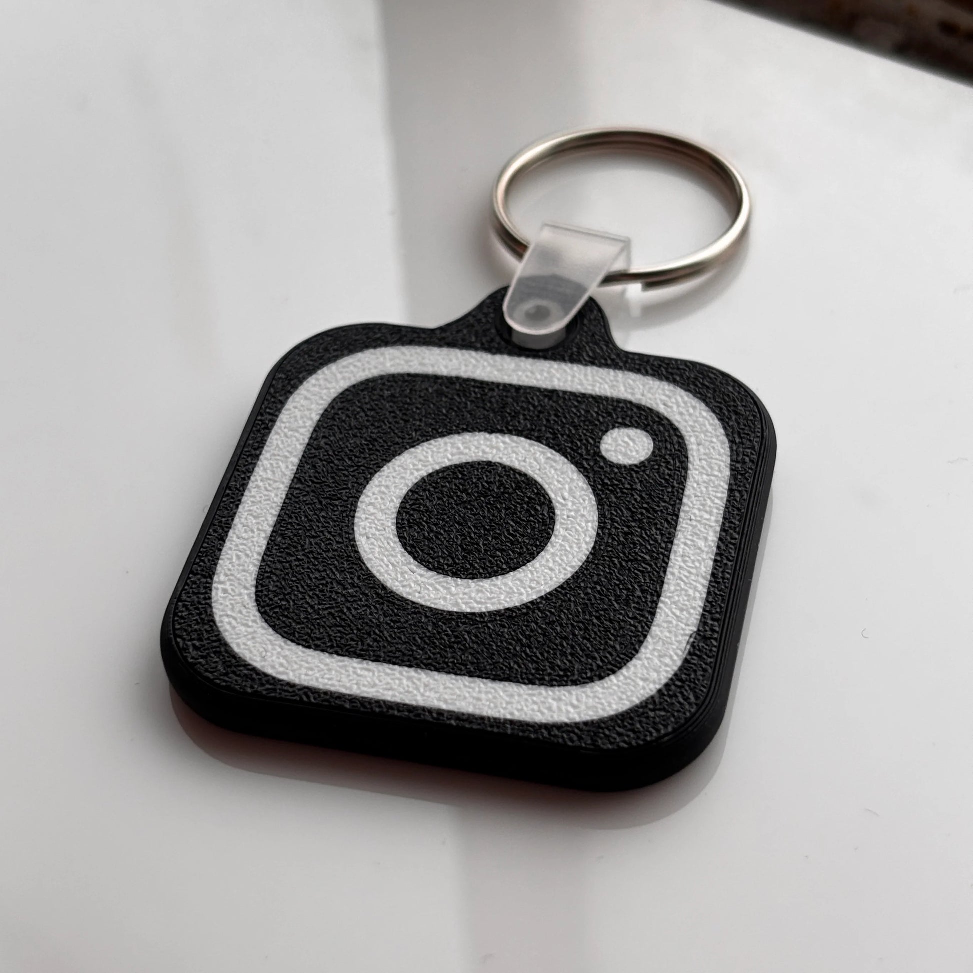 Black and White 3D-Printed Instagram Logo Keychain with NFC Tap Function