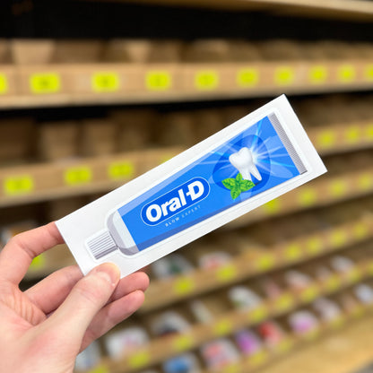Funny toothpaste parody sticker styled like Oral-B with “blow expert” joke text
