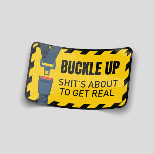 “Buckle Up Sh*t’s About To Get Real” funny vinyl sticker with seatbelt graphic, bold novelty car sticker for drivers with humour.