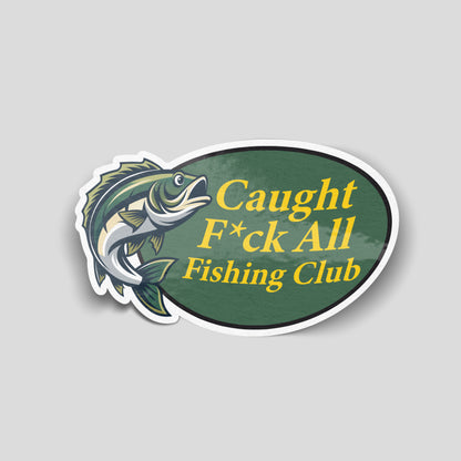 Green oval funny car sticker featuring a jumping fish and the text “Caught Fck All Fishing Club”, UK angling humour decal.*
