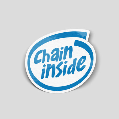 Blue “Chain Inside” funny car sticker styled like a tech badge, novelty UK motoring decal.