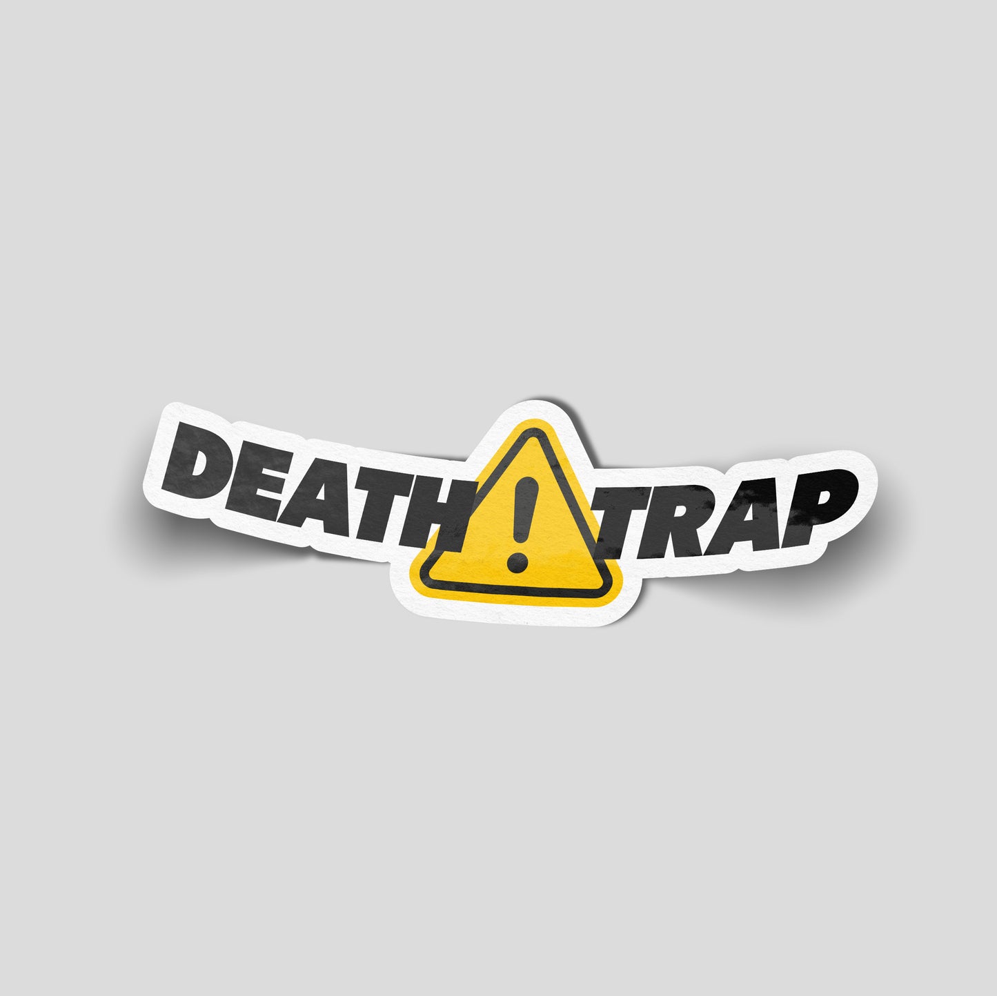 Death Trap funny vinyl car sticker with bold black lettering and yellow warning hazard triangle. Gloss laminated waterproof UK made decal, perfect for modified cars, project builds, track cars and garage walls.