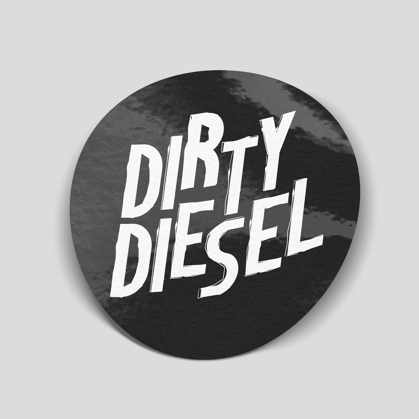 Black circular funny car sticker with bold white “Dirty Diesel” text, UK motoring humour decal.