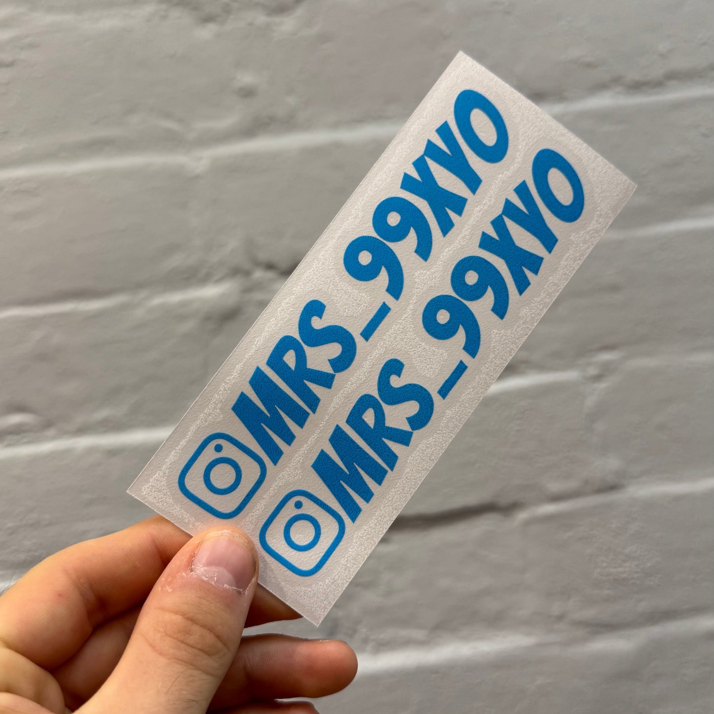 Personalised light blue Instagram handle stickers with Instagram logo, custom gloss vinyl social media decals for cars
