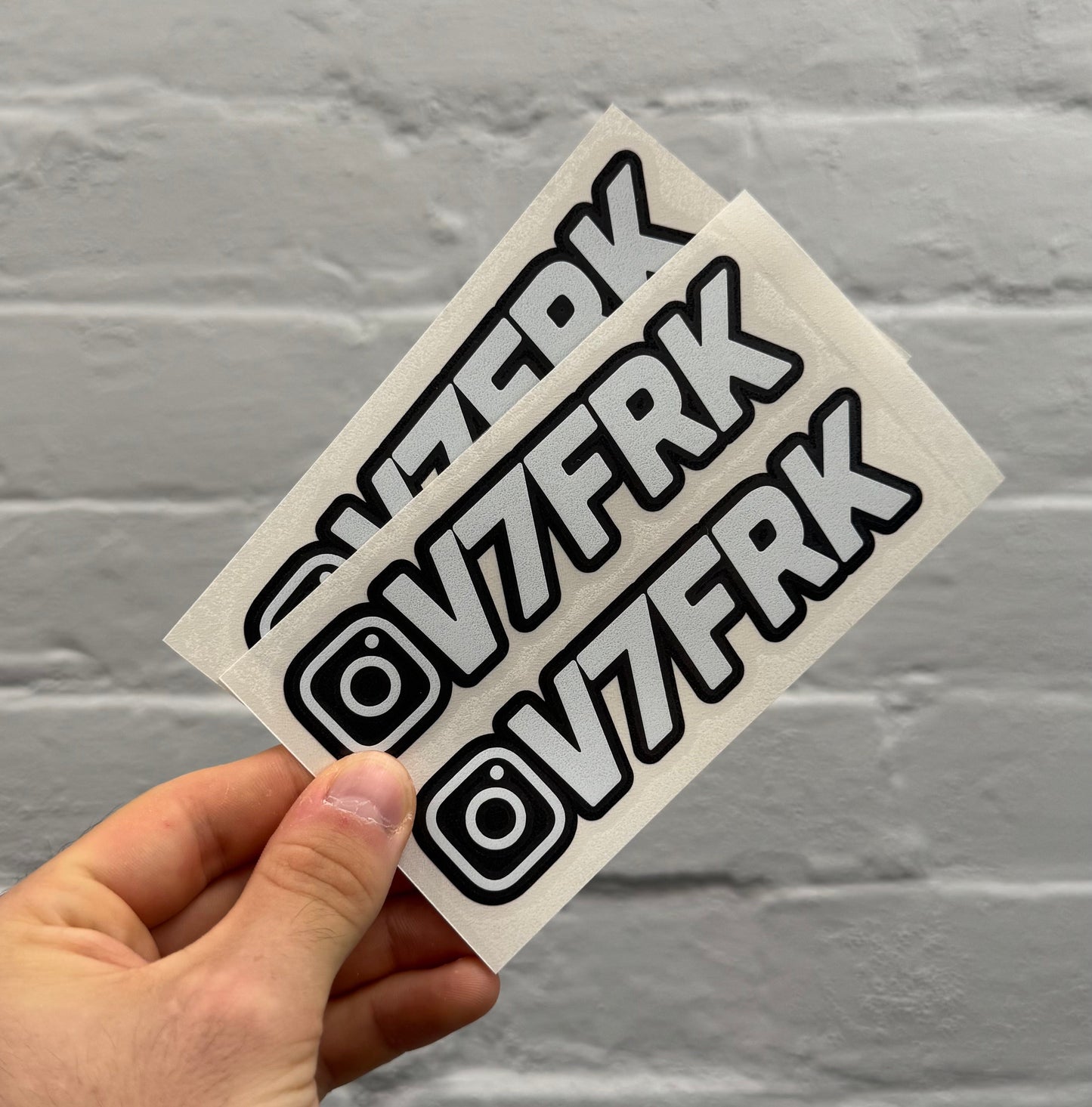 Custom gloss white Instagram tag stickers with black outline, personalised Instagram username vinyl decals for cars