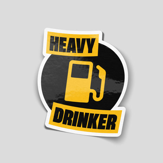 Black and yellow funny car sticker featuring a fuel pump icon and the text “Heavy Drinker”, UK motoring and drinking humour decal.