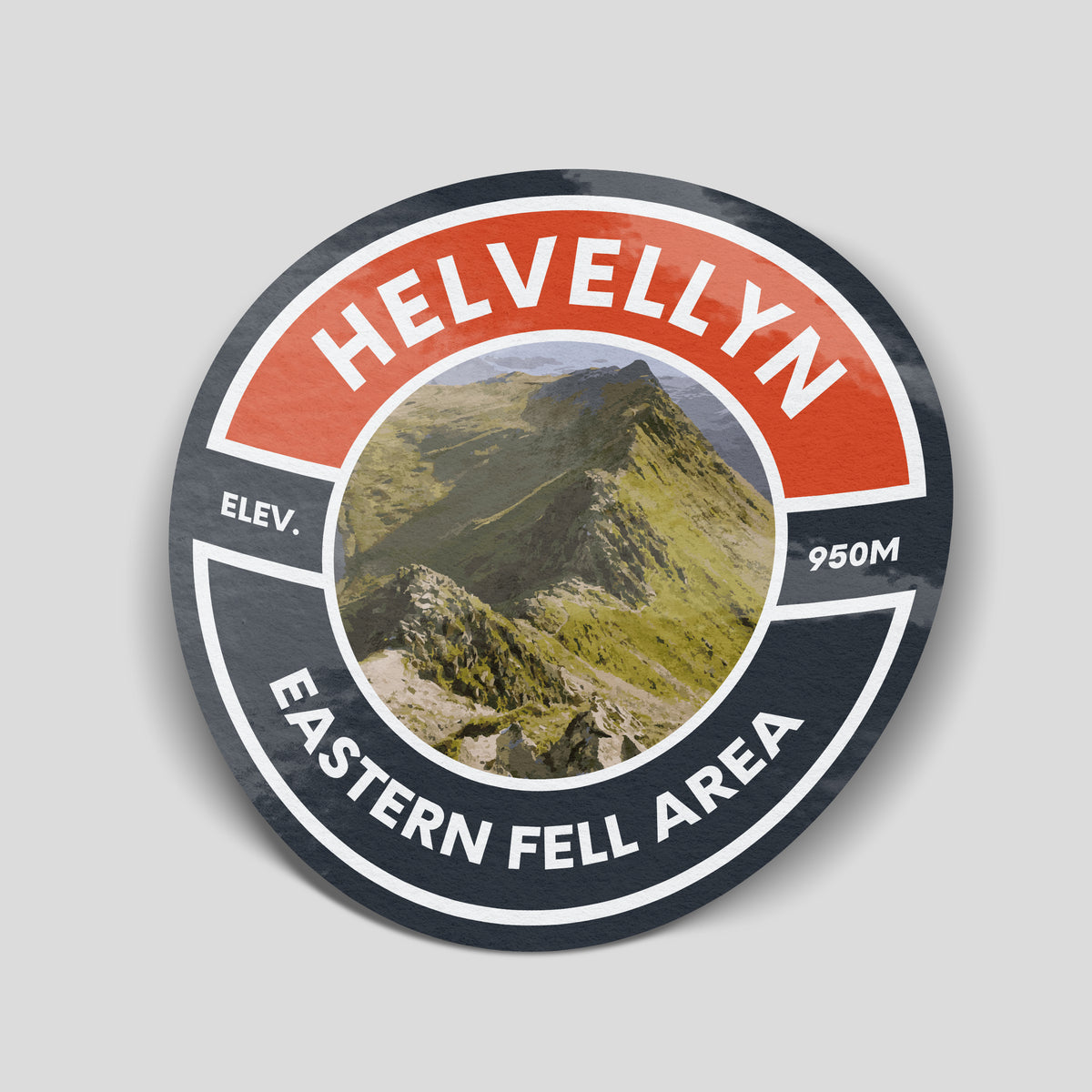 Orange and charcoal Helvellyn hiking sticker with a rocky ridge scene, 950m elevation and Eastern Fell Area lettering.