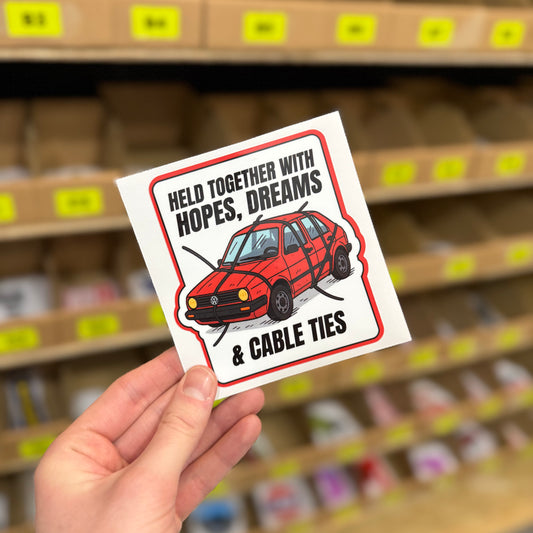 Funny car sticker showing red hatchback held together with cable ties illustration