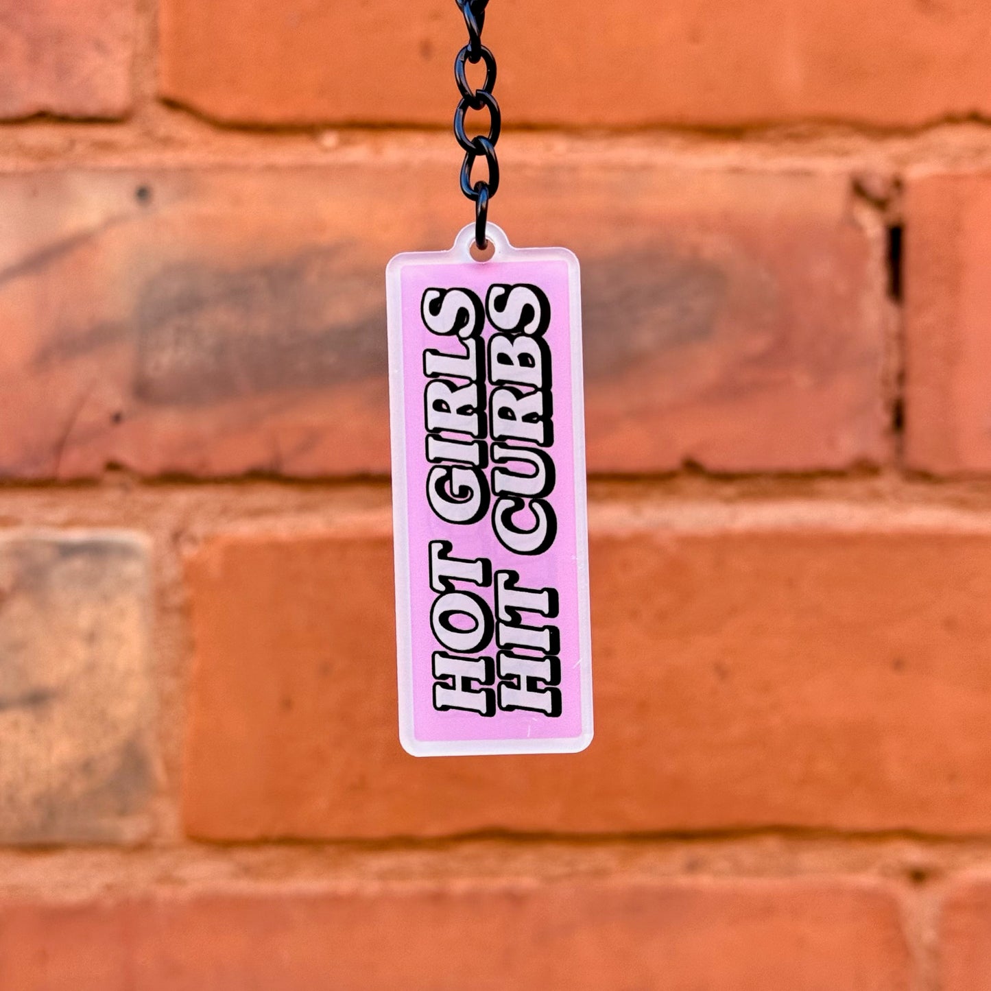 Hot Girls Hit Curbs funny acrylic keychain with pink design and gloss black chain