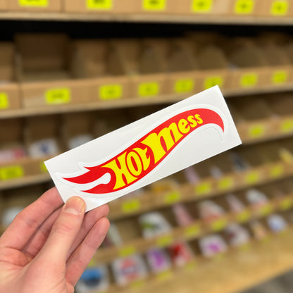 Funny parody sticker reading “hot mess” styled like flame logo graphic