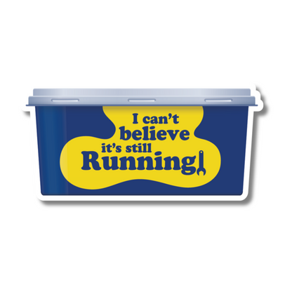 Sticker shaped like a yellow and blue butter tub with the phrase “I Can’t Believe It’s Still Running” – perfect for cars, vans and toolboxes.