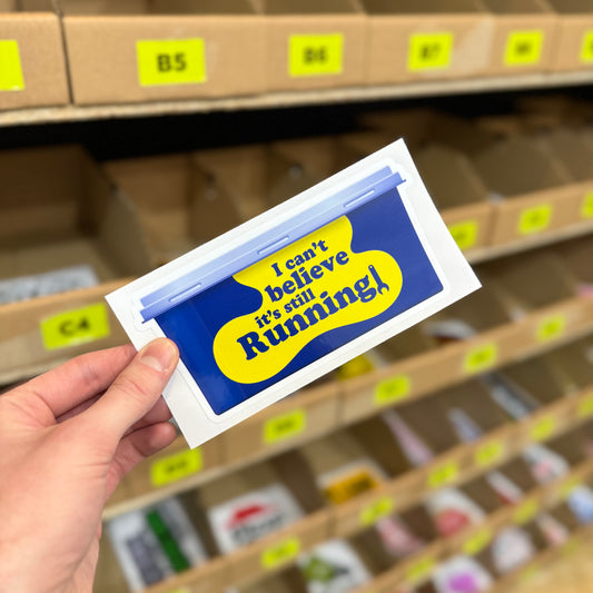 Funny car sticker reading “I can’t believe it’s still running” engine joke design