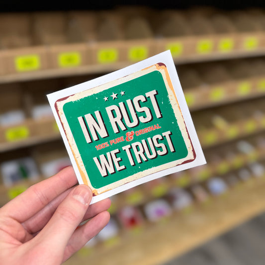 Funny car enthusiast sticker reading “in rust we trust” vintage metal sign style