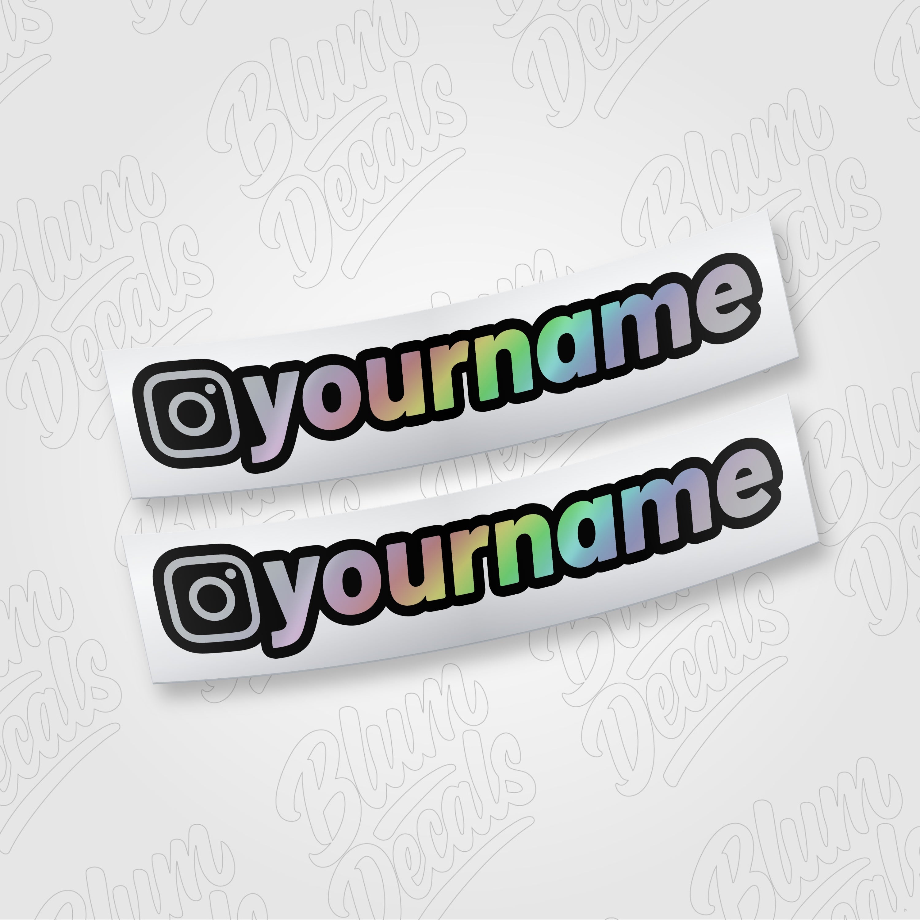 Custom Instagram username vinyl decal in silver holographic with a black outline, shown in font 19