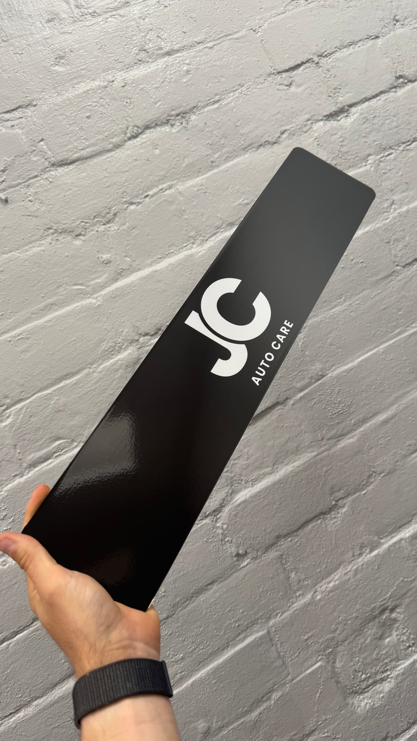 Black personalised car show plate featuring JC Auto Care logo, custom business show plate printed in the UK