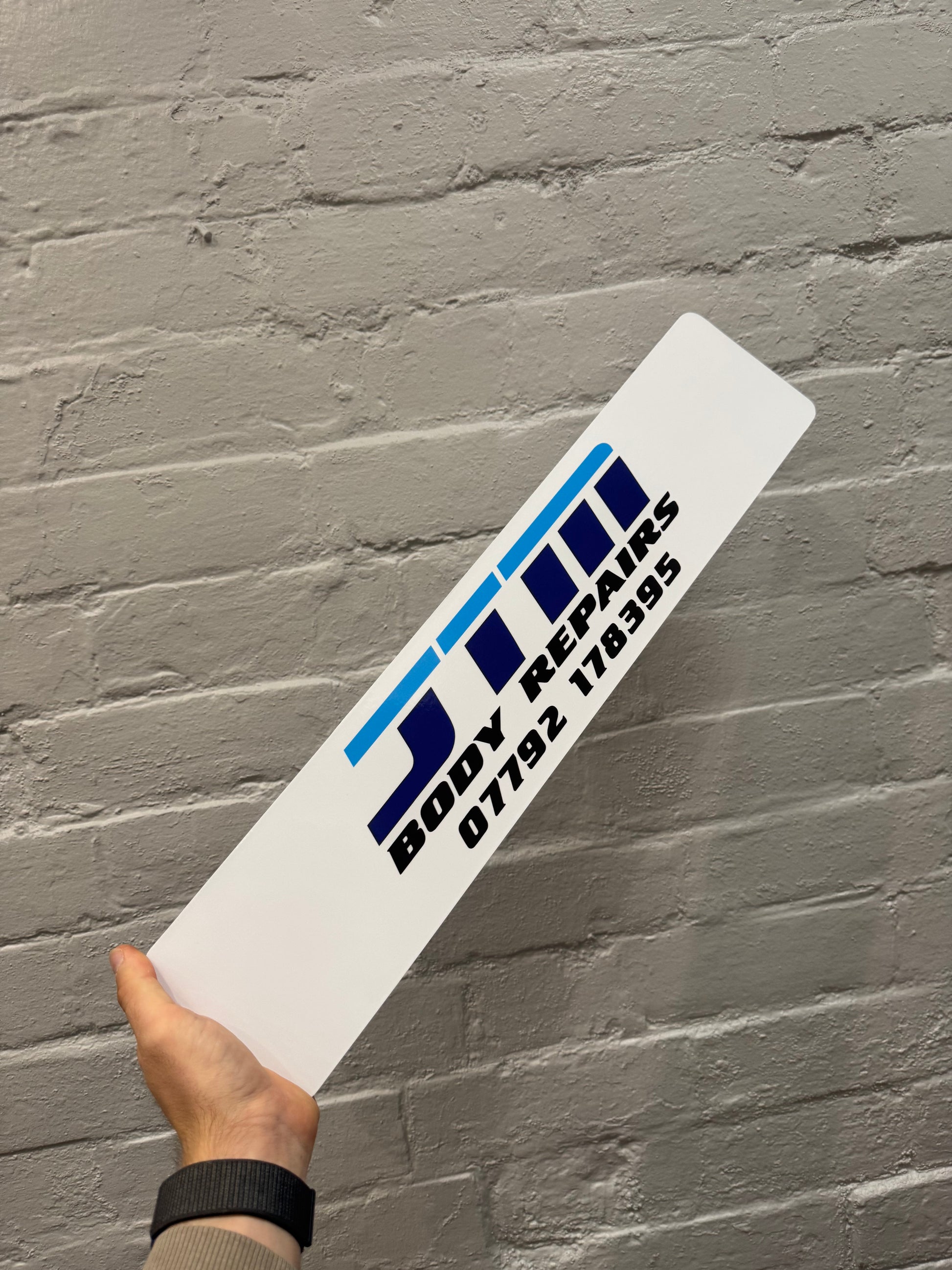 Custom show plate with JTM Body Repairs business logo, printed on a personalised 520mm acrylic car show plate in the UK