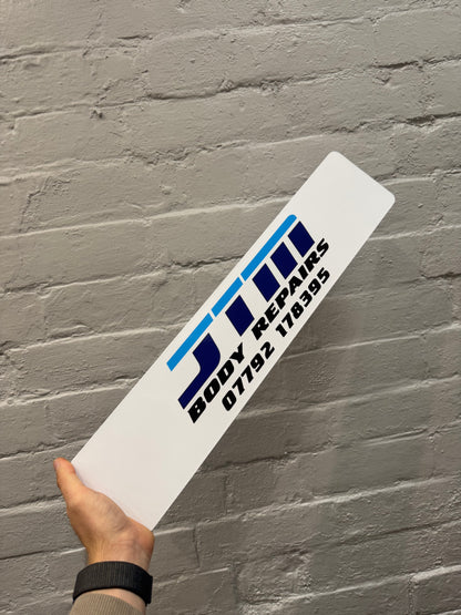 Custom show plate with JTM Body Repairs business logo, printed on a personalised 520mm acrylic car show plate in the UK