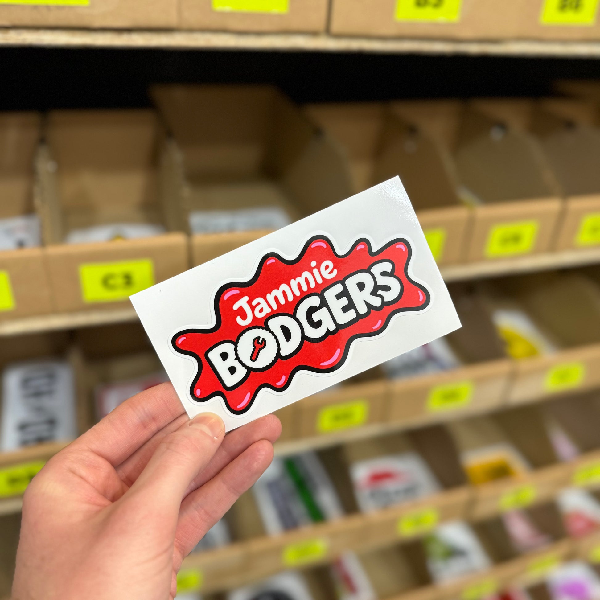 Funny car sticker reading “Jamie Bodgers” in red and black cartoon logo style