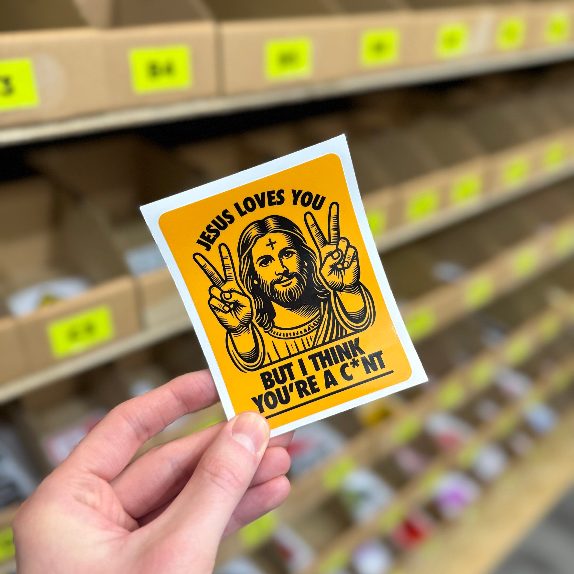 Funny rude religious parody sticker reading “Jesus loves you but I think you’re a cunt”