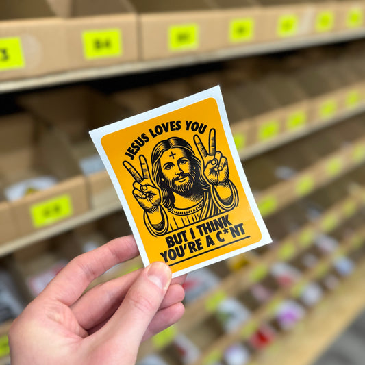 Funny rude religious parody sticker reading “Jesus loves you but I think you’re a cunt”