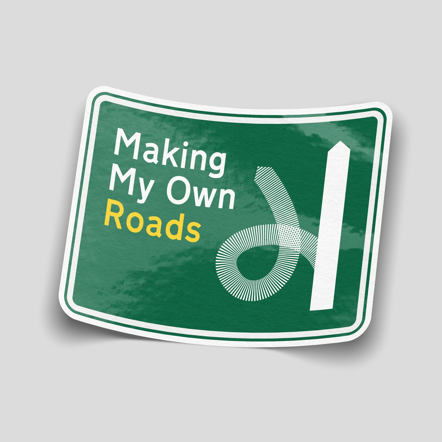 Green road‑sign style funny car sticker reading “Making My Own Roads” with abstract white road graphic, UK off‑road and car culture decal.