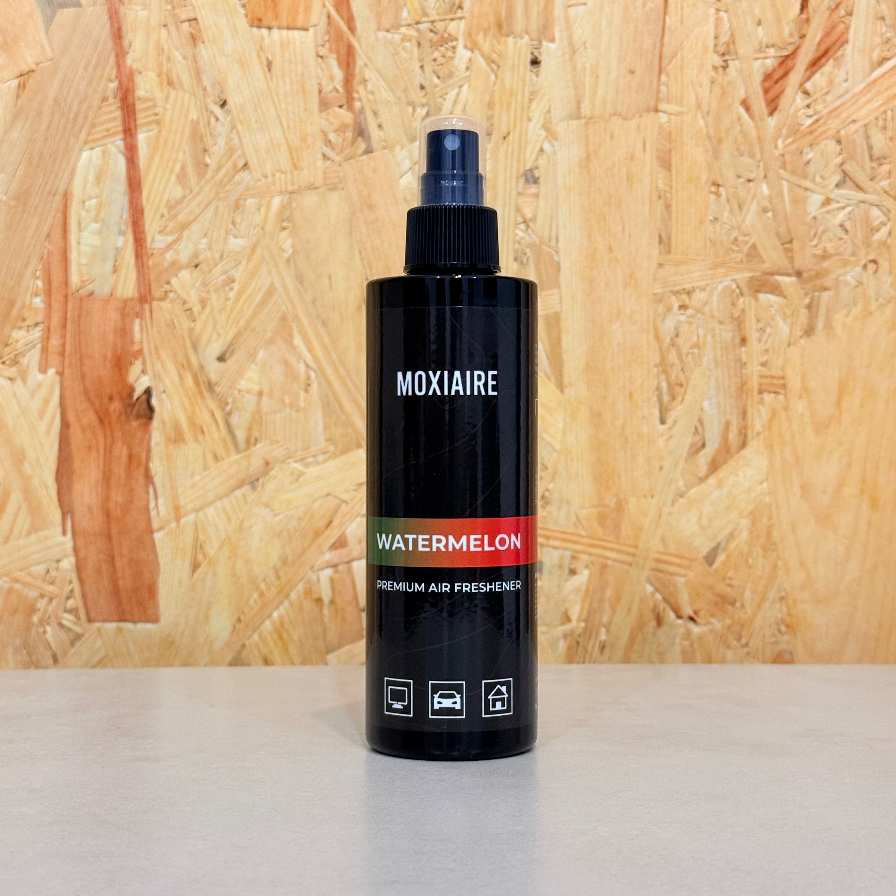 Moxiaire Watermelon Premium Spray Air Freshener bottle on neutral background