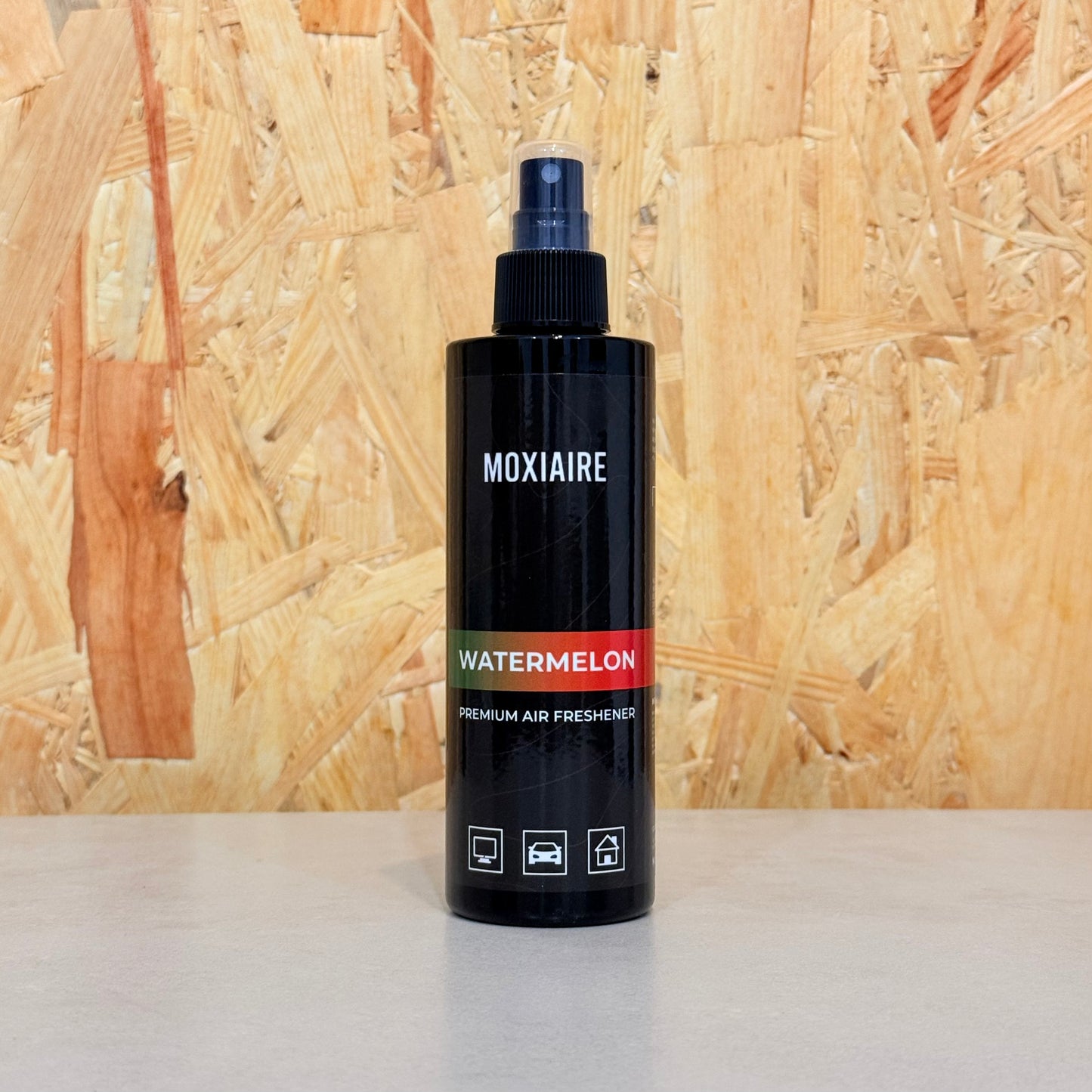 Moxiaire Watermelon Premium Spray Air Freshener bottle on neutral background