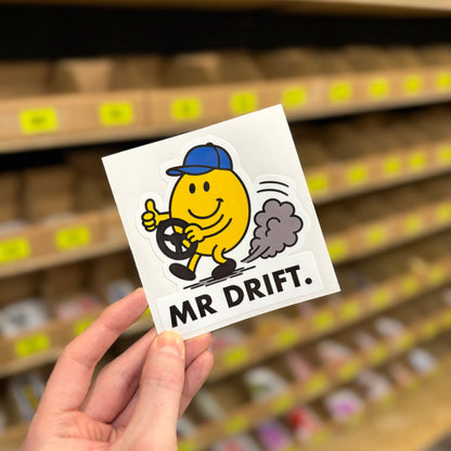 Funny drift car sticker showing cartoon character drifting with “mr drift” text