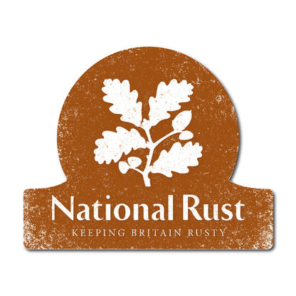 Sticker featuring the phrase “National Rust – Keeping Britain Rusty” with a white oak leaf graphic on a rusty brown background.