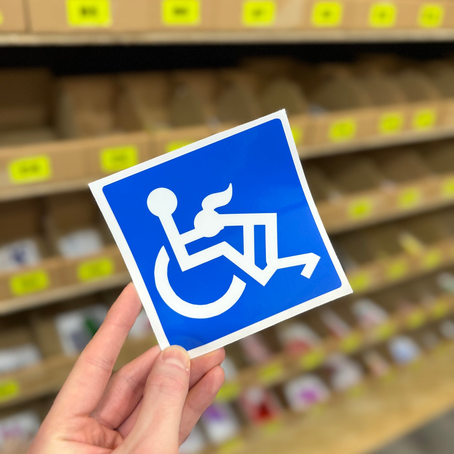 Funny rude sticker showing modified disabled symbol with cheeky pose illustration