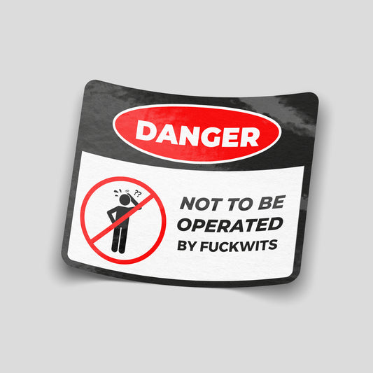 Not to be operated by fuckwits warning sign funny car sticker, bold UK garage humour vinyl by Blum Decals