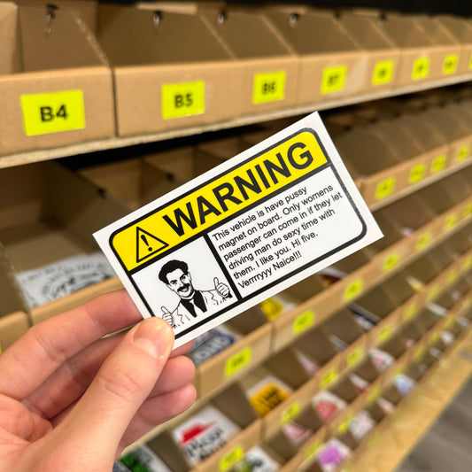 Funny rude car sticker reading “pussy magnet” bold novelty vinyl design