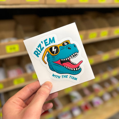 Funny cartoon dinosaur sticker wearing sunglasses with “rizz em with the tism” text