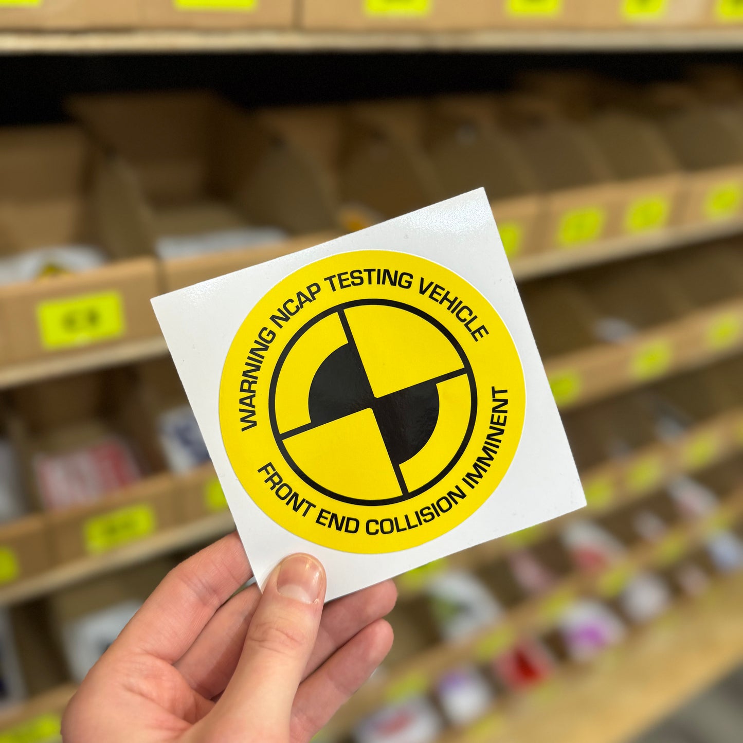Yellow NCAP testing warning funny car sticker with crash test symbol