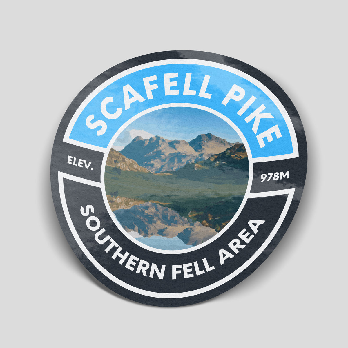 Blue and charcoal Scafell Pike mountain sticker with a landscape reflected in water, 978m elevation and Southern Fell Area text.