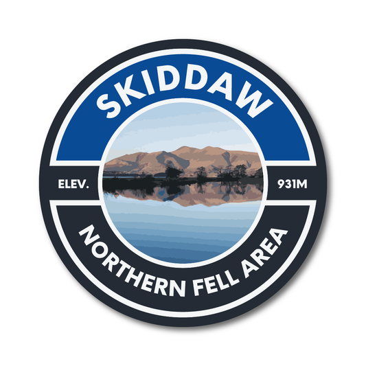Round vinyl sticker with “Skiddaw Northern Fell Area” text and a scenic mountain design showing Skiddaw (931m) reflected in water.