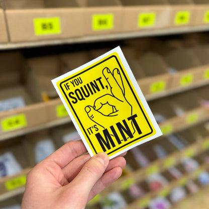If you squint it’s mint funny vinyl sticker with yellow warning sign style graphic